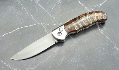 Выкидной нож "Рысь": сталь - Bohler S390; рукоять - зуб мамонта